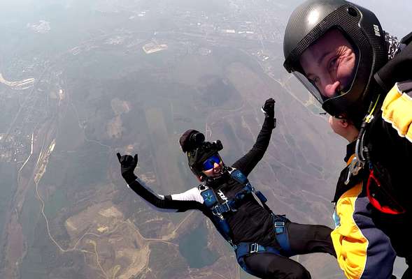 Your cameraman is documenting every step of your skydive adventure